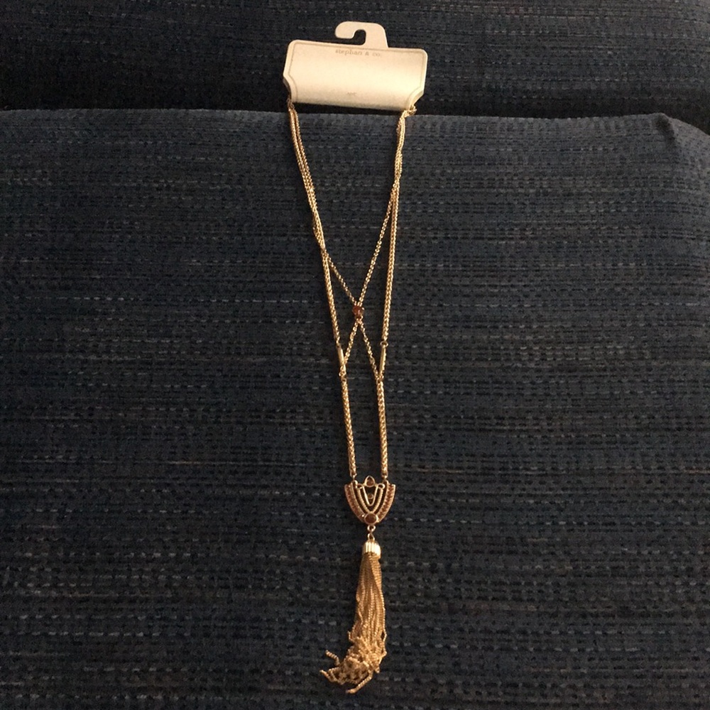 Long gold necklace